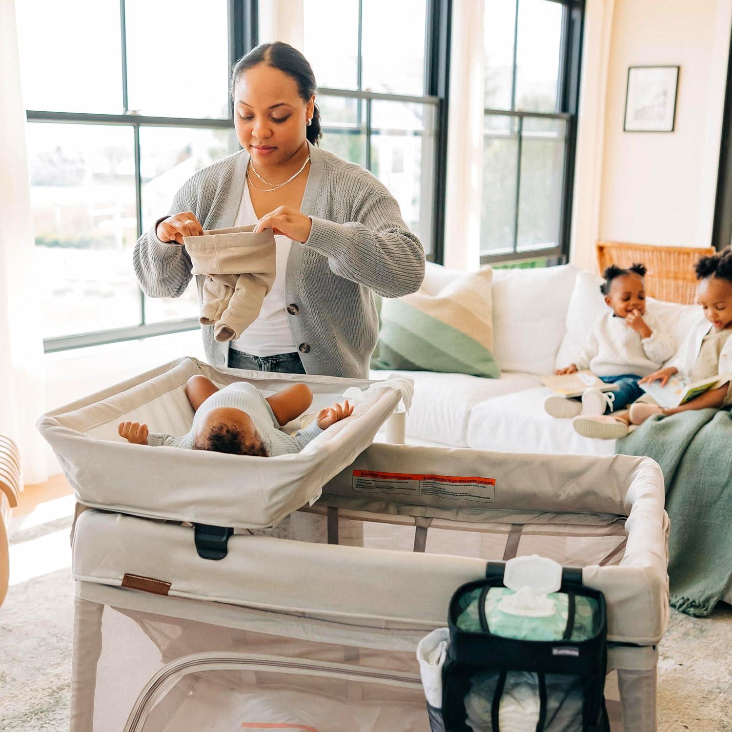 imageUPPAbaby Remi Changing StationWipeable SurfaceSimple Attachment and StorageWells Dark Taupe MlangeJake Charcoal