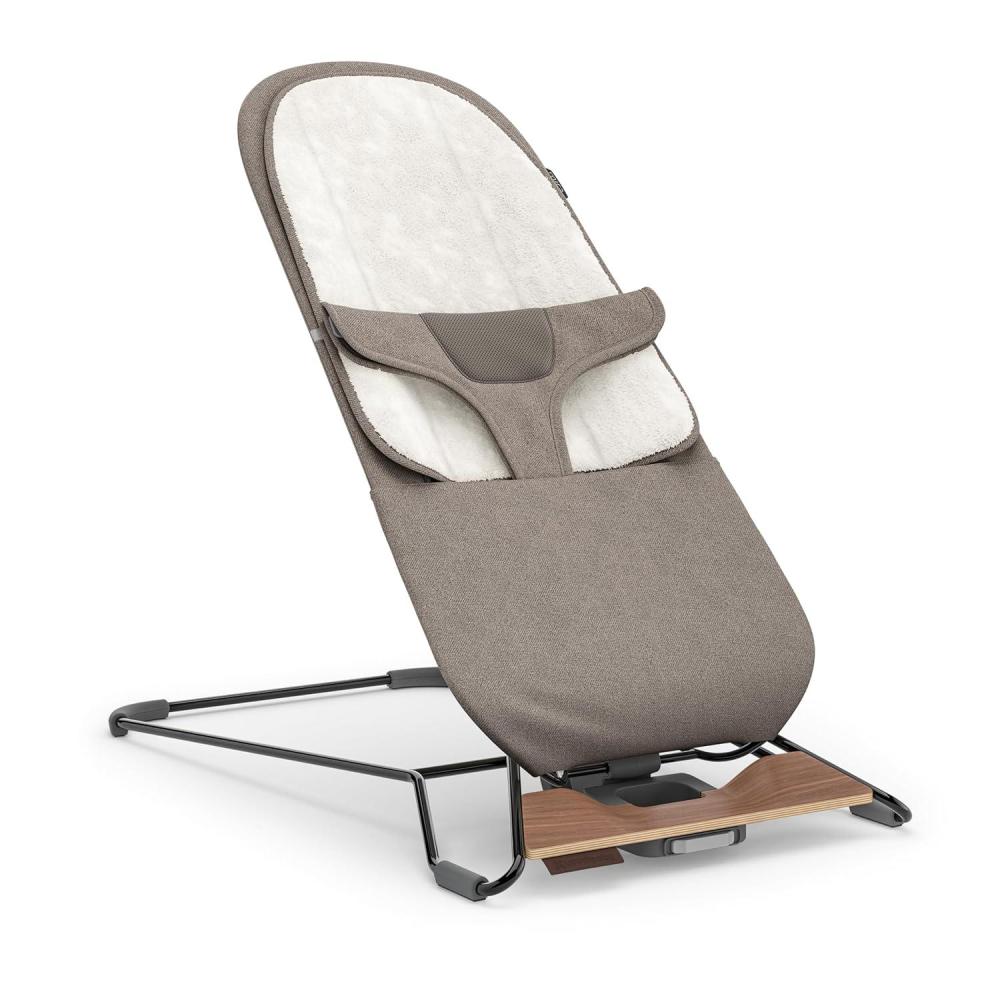 imageUPPAbaby Mira BouncerPortable 2in1 Bouncer Seat Grows With Your BabyGREENGuard Gold JPMA FSC certifiedCozy Seat Liner Storage Bag IncludedCharlie Sand MlangeBlack ChromeWalnut WoodWells