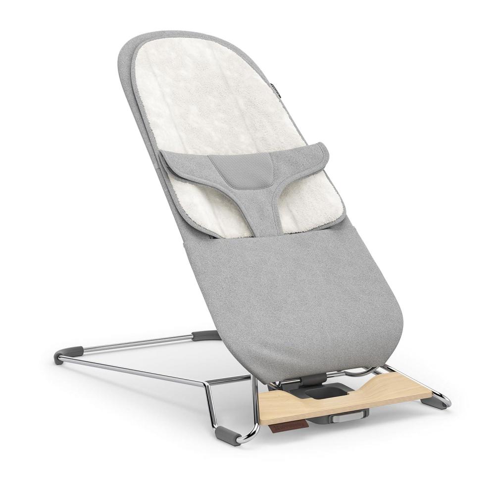 imageUPPAbaby Mira BouncerPortable 2in1 Bouncer Seat Grows With Your BabyGREENGuard Gold JPMA FSC certifiedCozy Seat Liner Storage Bag IncludedCharlie Sand MlangeBlack ChromeWalnut WoodStella