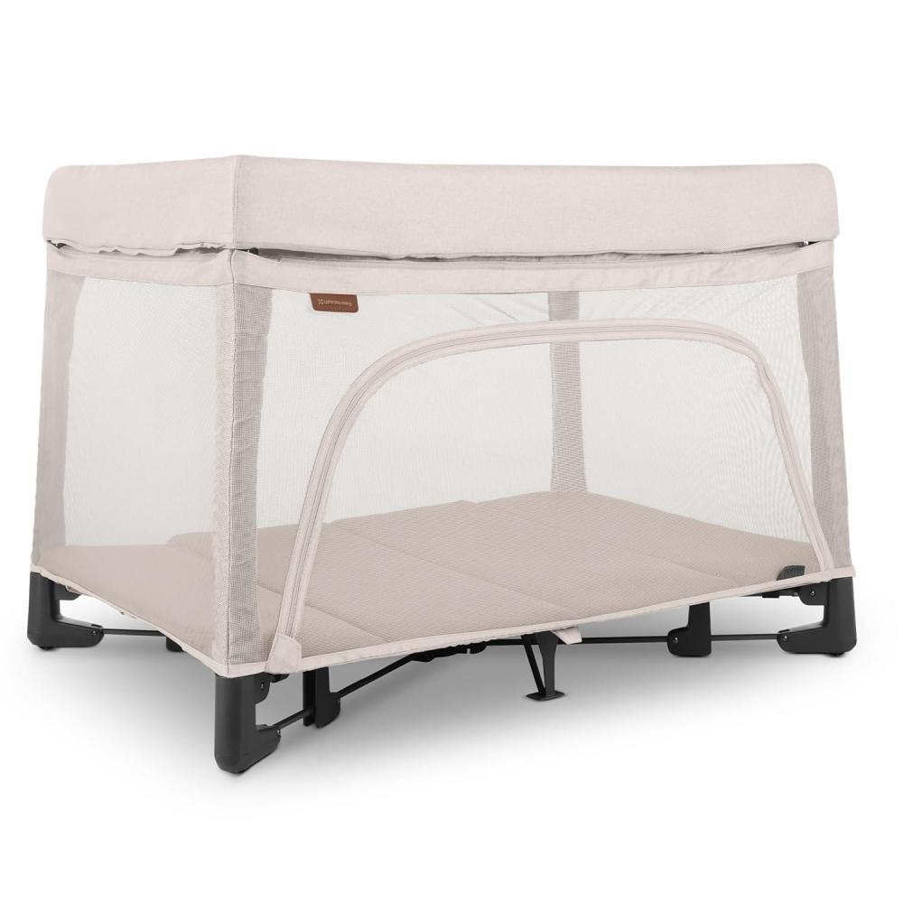 imageUPPAbaby Remi Playard  Deluxe 3in1 Portable Playard Bedside Bassinet  Travel Crib Mesh Bassinet Mattress Organic Cotton Mattress Cover  Storage Bag Included  Charlie Sand MlangeCharlie Sand Mlange